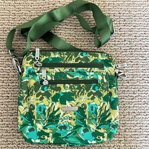 Baggallini cross body bag with RFID card pockets.